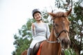 two equestrian athletes ride horses and start training