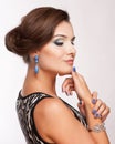 Beautiful woman with evening make-up. Jewelry and Beauty. Royalty Free Stock Photo