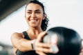 Beautiful woman exercising with fitness ball outdoors Royalty Free Stock Photo