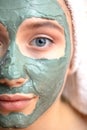 Macro shot woman face with clay facial mask on face isolated, clos up, macro Royalty Free Stock Photo