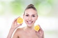 Beautiful woman face with juicy orange Royalty Free Stock Photo