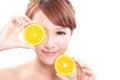 Beautiful woman face with juicy orange Royalty Free Stock Photo