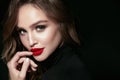Beautiful Woman Face With Makeup And Red Lips.