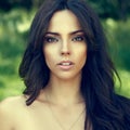 Beautiful woman face outdoor portrait - close up Royalty Free Stock Photo