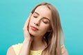 Beautiful Woman Face Portrait Beauty Skin Care Concept: beauty young caucasian female model girl touching her face skin Royalty Free Stock Photo
