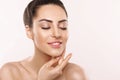 Beautiful Woman Face Skin Care. Portrait Of Attractive Young Female Applying Cream Cosmetics. Royalty Free Stock Photo