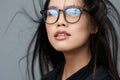 Beautiful woman fashion asian smile cute portrait background glasses studio student face business Royalty Free Stock Photo