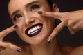 Beautiful Woman With Fashion Makeup, Dark Lips, Stylish Nails Royalty Free Stock Photo