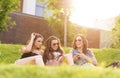 3 Beautiful woman feels good in the grass Royalty Free Stock Photo