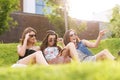 3 Beautiful woman feels good in the grass Royalty Free Stock Photo