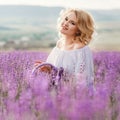 Beautiful woman in a field of blossoming lavender Royalty Free Stock Photo