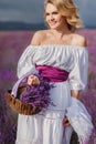 Beautiful woman in a field of blossoming lavender Royalty Free Stock Photo