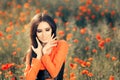 Beautiful Woman in a Field of Poppies Royalty Free Stock Photo