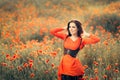 Beautiful Woman in a Field of Poppies Royalty Free Stock Photo