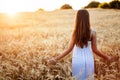 Beautiful woman in fields of barley Royalty Free Stock Photo