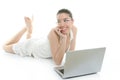 Beautiful woman on floor with laptop computer Royalty Free Stock Photo