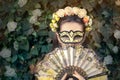 Beautiful Woman with Floral Wreath, Mask and Fan