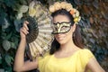 Beautiful Woman with Floral Wreath, Mask and Fan