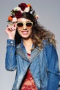 Beautiful woman in flower crown wearing sunglasses Royalty Free Stock Photo