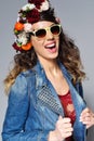 Beautiful woman in flower crown wearing sunglasses Royalty Free Stock Photo