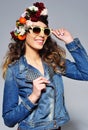 Beautiful woman in flower crown wearing sunglasses Royalty Free Stock Photo