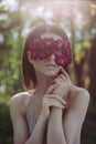 Beautiful woman with flower mask beauty studio portrait photoshoot Royalty Free Stock Photo
