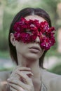 Beautiful woman with flower mask beauty studio portrait photoshoot Royalty Free Stock Photo