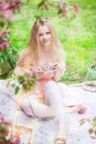 Beautiful woman with flowering tree