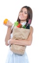 Beautiful woman with fresh organic shopping paper Royalty Free Stock Photo