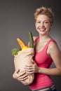 Beautiful woman with fruits and vegetables