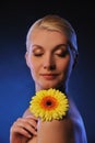 beautiful woman with gerber flower Royalty Free Stock Photo