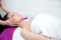 Beautiful woman is getting a facial massage in the spa salon Royalty Free Stock Photo