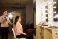 Beautiful woman getting haircut by hairdresser in the beauty salon. Royalty Free Stock Photo