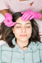 Beautiful Woman Getting Her Eyebrows In Shape At Parlor