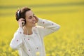 Beautiful woman girl listening to music in headphone Royalty Free Stock Photo