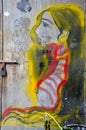 Beautiful woman with golden hair door graffiti art