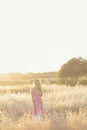 A beautiful woman in golden hay field 5 Royalty Free Stock Photo