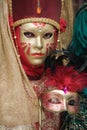 Beautiful woman with golden mask