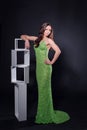 Beautiful woman in a green evening dress Royalty Free Stock Photo