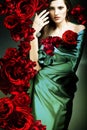 Beautiful woman in green fabric Royalty Free Stock Photo