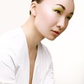 Beautiful Woman With Green Fashion Makeup.