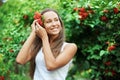 Beautiful woman with guelder rose in hair Royalty Free Stock Photo