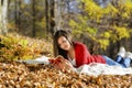 Beautiful woman guitar player girl in the forest Royalty Free Stock Photo