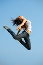 Beautiful woman in gymnastic jump Royalty Free Stock Photo