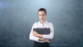 Beautiful woman with hair ban in white skirt close up portrait with grey briefcase,isolated background.Business concept. Royalty Free Stock Photo