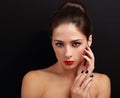 Beautiful woman with hairstyle, red bright lips and black nails Royalty Free Stock Photo