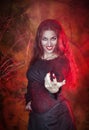 Beautiful woman in halloween style beckoning finger