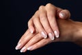 Beautiful woman hand with french manicure Royalty Free Stock Photo