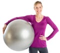 Beautiful Woman With Hand On Hip Holding Fitness Ball Royalty Free Stock Photo