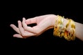 Beautiful woman hand hold gold bracelet jewelry, accessory and f